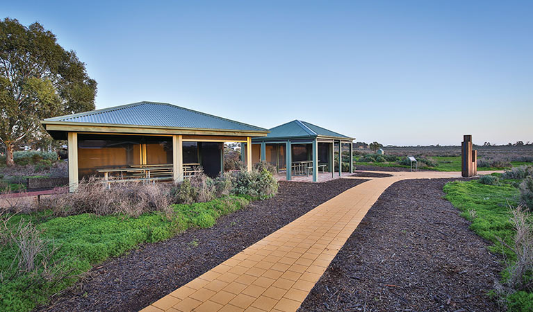 Sheltered picnic tables near Mungo Visitor Centre in Mungo National Park. Photo: Corey Brown &copy; OEH and Vision House Photography