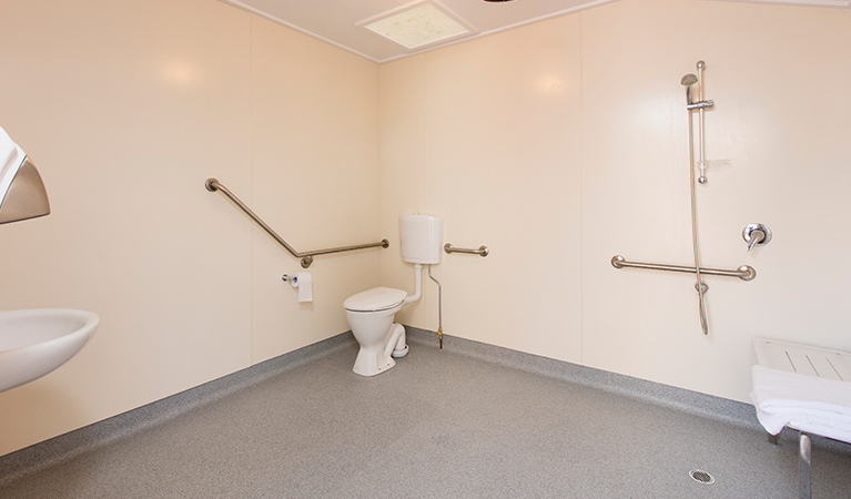 Interior of accessible bathroom at Mungo Shearers' Quarters accommodation. Photo: Vision House Photography/OEH