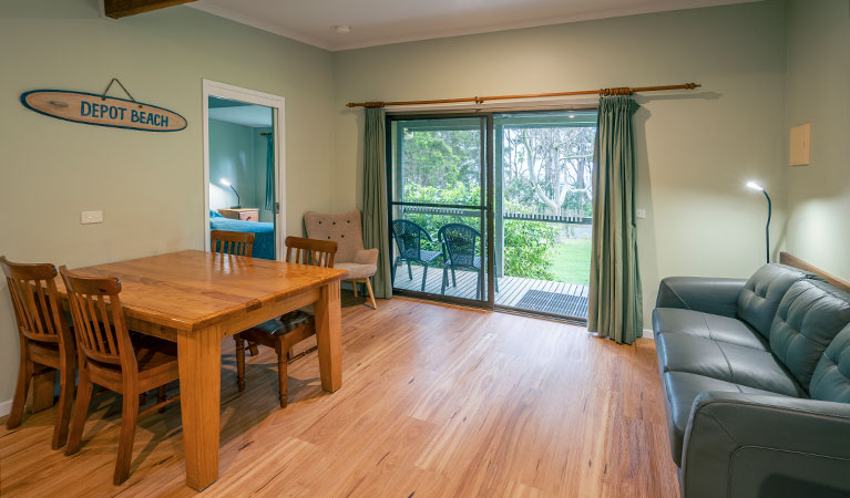 The combined living and dining room in Depot Beach cabins, Murramarang National Park. Photo: John Spencer &copy; DPIE