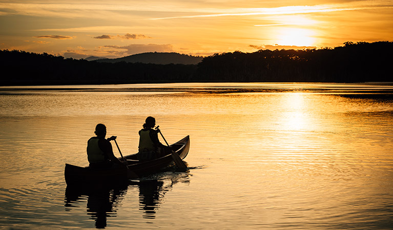 Kayakers on Durra Lake at sunset, Murramarang National Park. Photo &copy; Melissa Findley