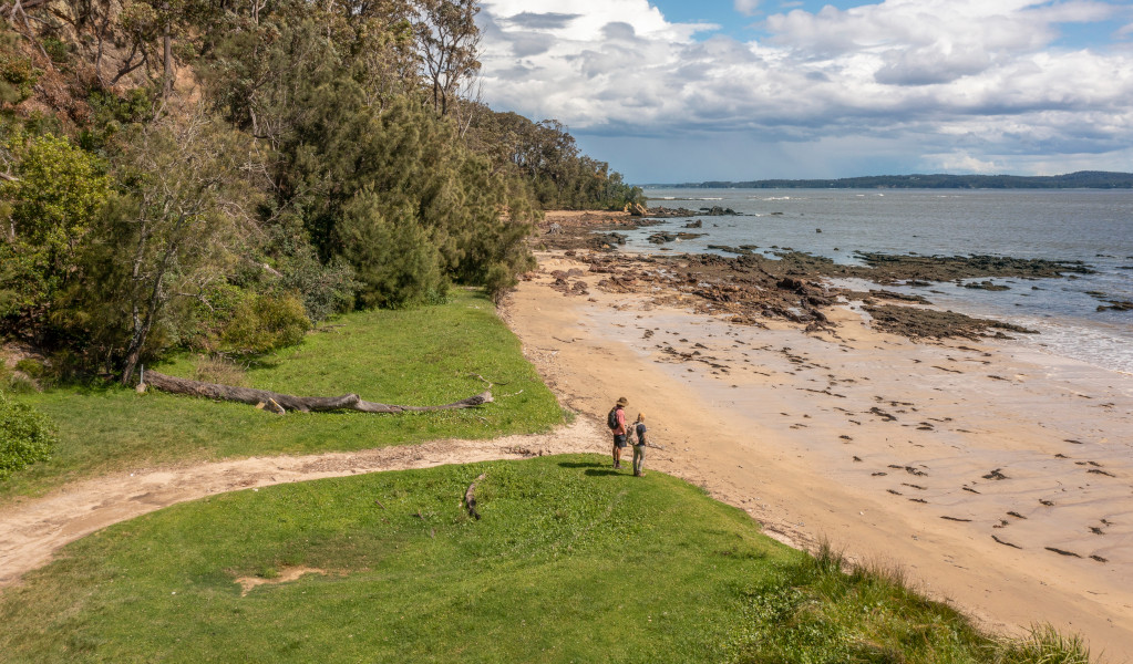 People on Maloneys Beach in Murramarang National Park. Credit: John Spencer &copy; DPE