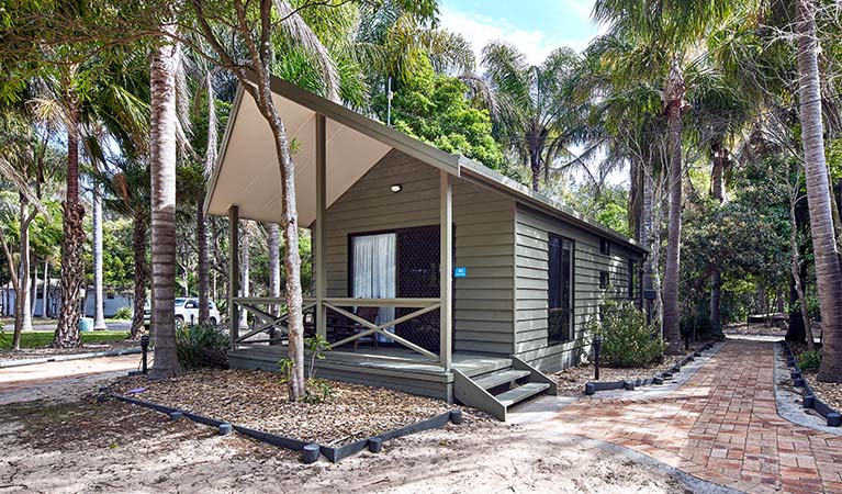 Exterior of a cabin at NRMA Murramarang Beachfront Holiday Resort. Photo: © NRMA Parks and Resorts.