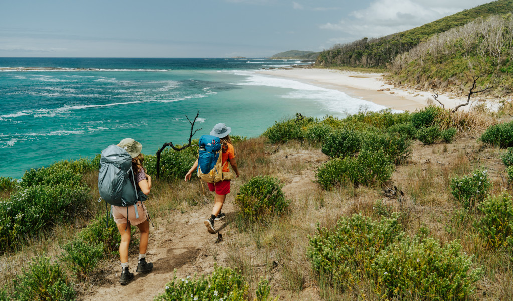 2 bushwalkers on Murramarang South Coast Walk between Pretty Beach and Pebbly Beach. Credit: Remy Brand &copy; Remy Brand