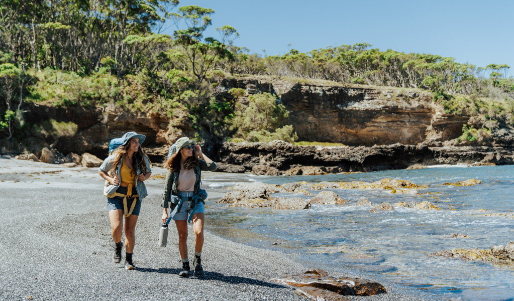 2 bushwalkers crossing Dark Beach, Murramarang South Coast Walk. Credit: Remy Brand &copy; Remy Brand