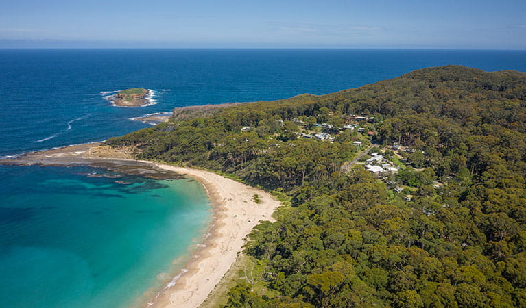 Aerial view of Depot Beach cabins and nearby Depot Beach in Murramarang National Park. Photo: John Spencer &copy; DPIE