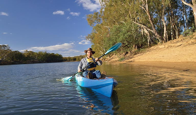 Man kayaking near Benarca campground in Murray Valley Regional Park. Photo: Gavin Hansford/NSW Government