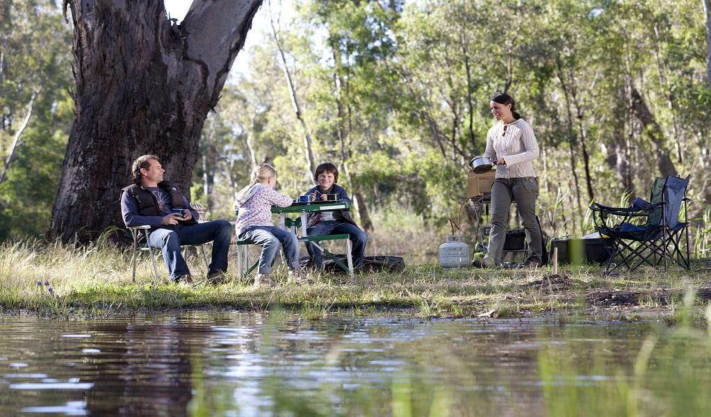 Campers by the river at Corowa campgrounds in Murray Valley National Park. Photo: David Finnegan &copy; DPIE