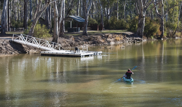 Man kayaking on Edward River, heading back to the kayak launch. Photo &copy; Rhys Leslie