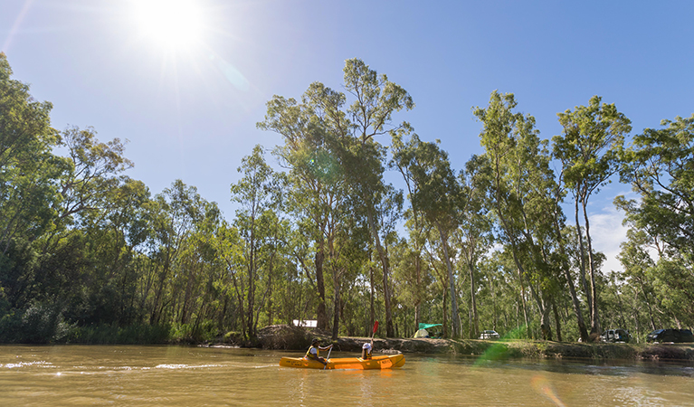 Paddlers pass by Swifts Creek campground, Murray Valley National Park. Photo: B Ferguson/OEH