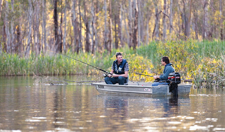 2 friends fishing in a boat on Gulpa Creek in Murray Valley National Park. Photo: David Finnegan &copy; DPIE