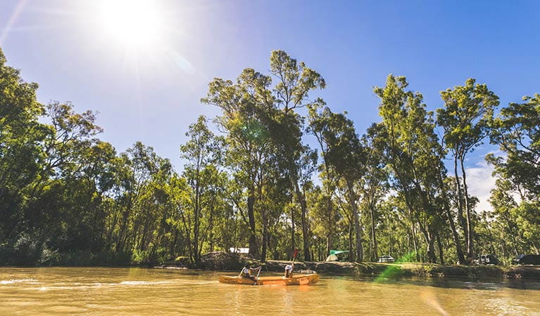 Kayakers float past Swifts Creek campground, Murray Valley National Park. Photo: B Ferguson/OEH