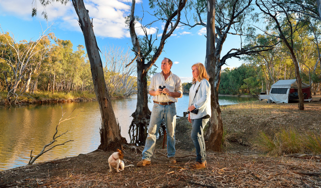 Campers with their dog in Murrumbidgee Valley Regional Park. Credit: Gavin Hansford &copy; DPE 