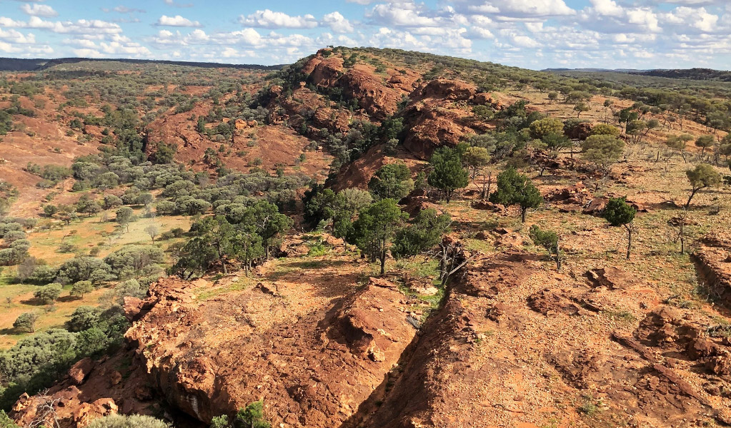 Aerial view of the rugged landforms around Split Rock walking track in Mutawintji National Park. Credit: Kristy Lawrie &copy; DCCEEW