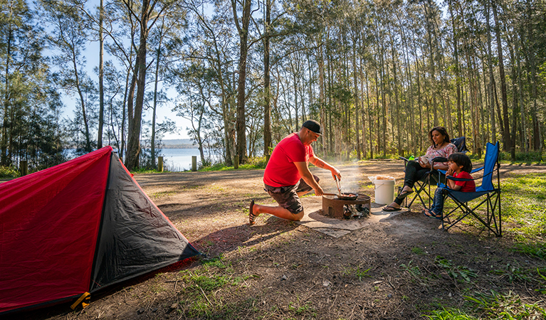 Campers cooking up a storm at Bungarie Bay campground. Photo: John Spencer/OEH