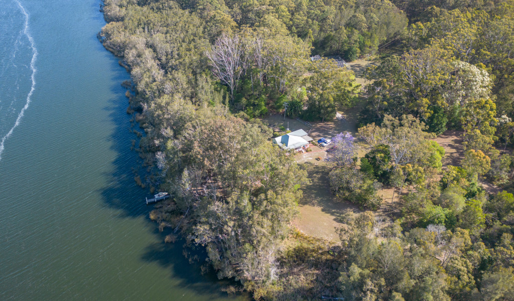 Aerial view of Cutlers Cottage near the lake's edge. Credit: John Spencer &copy; DPE