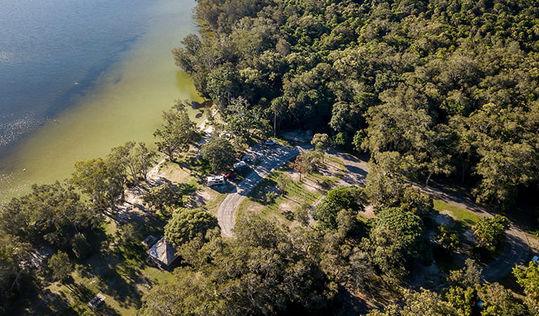 Aerial view of Mungo Brush campground and nearby Myall Lake in Myall Lakes National Park. Photo: John Spencer/DPIE