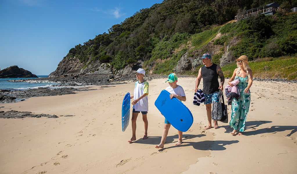 A family enjoying Boat Beach near Davies Cottage, Myall Lakes National Park. Credit: Brent Mail &copy; DPE