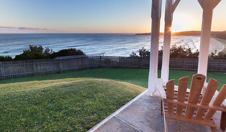 Sunset over the ocean from Head Keeper's cottage verandah in Myall Lakes National Park. Photo: Seal Rocks Lighthouse Cottages