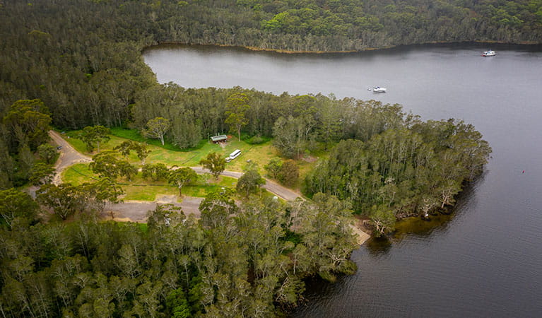 Aerial view of Violet Hill campground and picnic area with surrounding bushland and waterways in Myall Lakes National Park. Photo: John Spencer &copy; DPIE