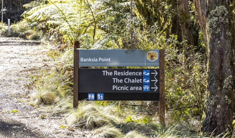 A directional sign at Banksia Point, New England National Park. Photo: Mitchell Franzi &copy; DPIE
