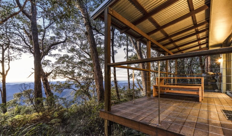 The balcony and surrounding bushland at The Chalet in New England National Park. Photo: Mitchell Franzi &copy; DPIE