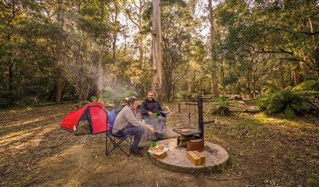 Friends cooking lunch on hot plate at Thungutti campground. Photo: John Spencer/OEH