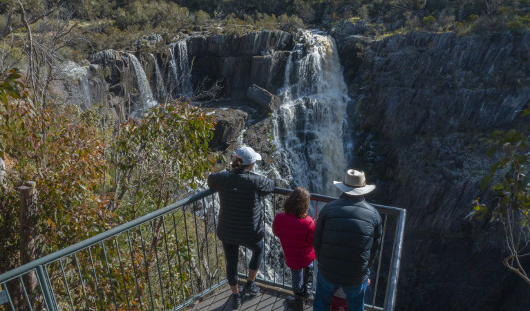 Family at Apsley Falls lookout Oxley Wild Rivers National Park. Photo: John Smith &copy; DPIE