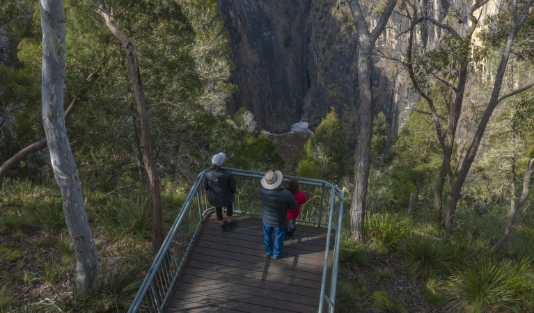 People at lookout in Oxley Wild Rivers National Park. Photo: John Smith &copy; DPIE