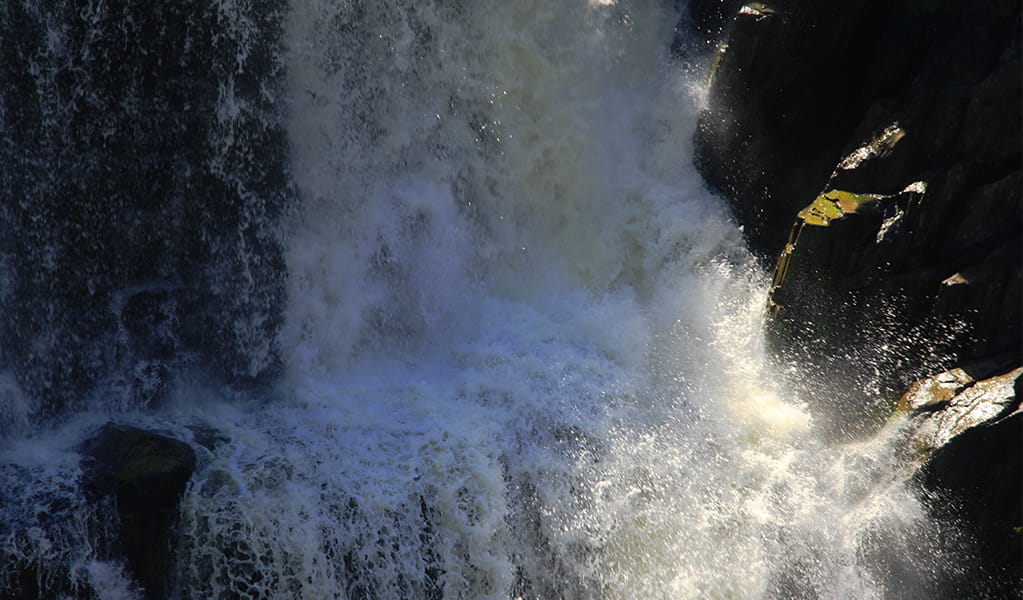 Close-up view of cascading water at the upper level of Apsley Falls. Photo &copy; Jessica Stokes