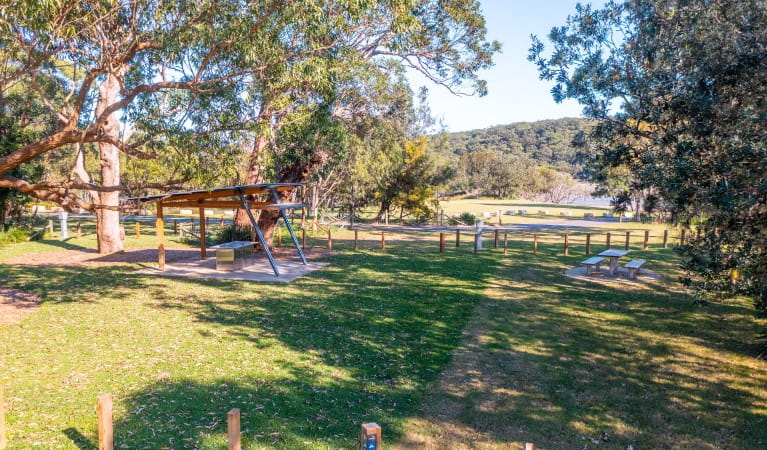 Picnic shelter and picnic tables in Bonnie Vale campground in Royal National Park. Photo: Andrew Elliot &copy; DPE