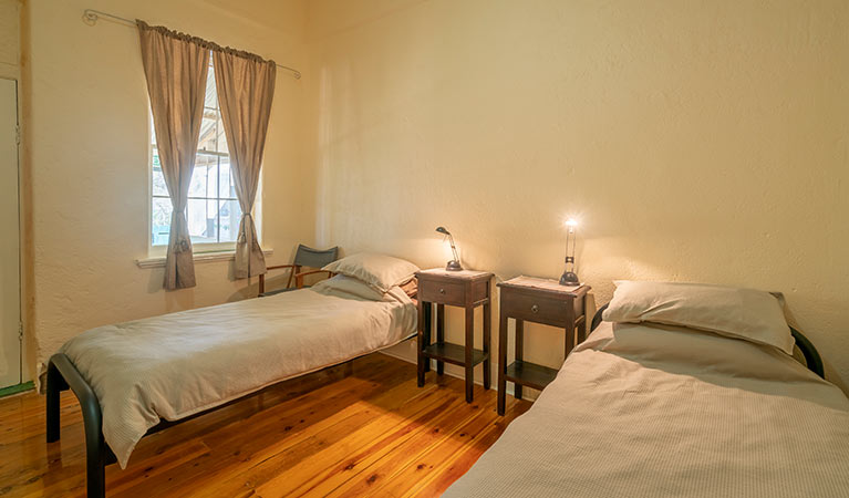 Bedroom with 2 single beds at Mount Wood Homestead. Photo: John Spencer/DPIE