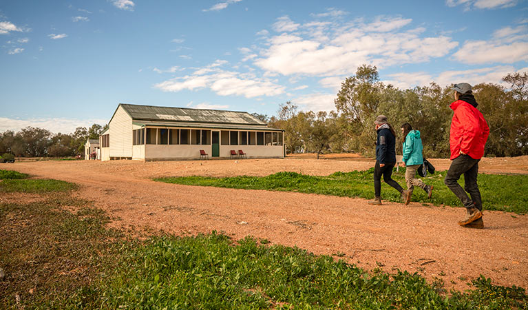 Group of friends walking outside Mount Wood Shearers Quarters. Photo: John Spencer/DPIE