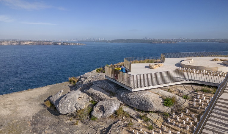 Visitors enjoying views across Sydney Harbour from Burragula lookout, Sydney Harbour National Park. Photo: John Spencer &copy; DPE