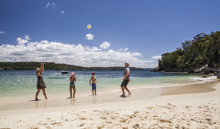 A family enjoying a day at Shark Beach, Sydney Harbour National Park. Photo: David Finnegan/DPIE