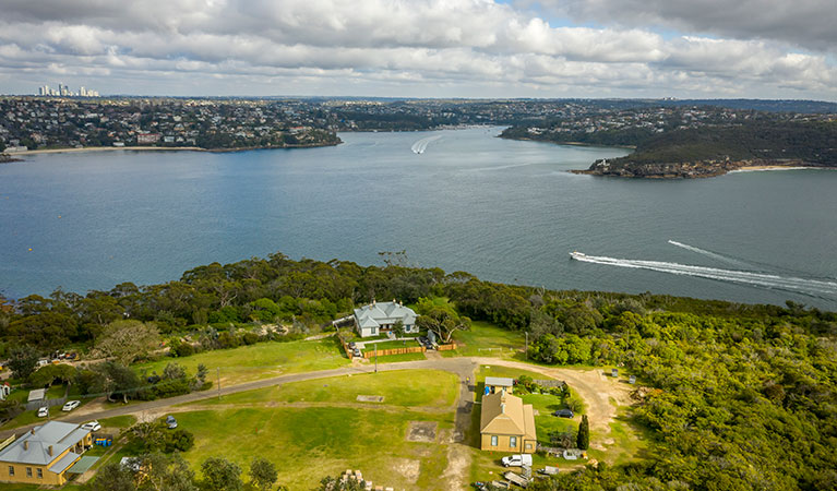 Officers Quarters with Sydney Harbour in the background at Middle Head - Gubbuh Gubbuh lookout. Credit: John Spencer &copy; DCCEEW