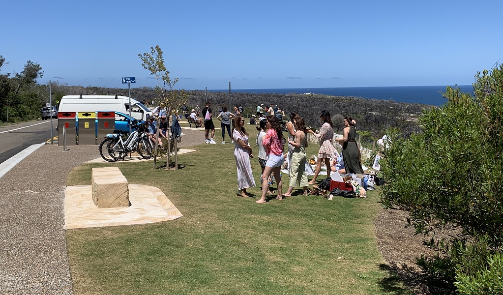 Visitors enjoying a picnic at North Head lookout, Sydney Harbour National Park. Photo: Katherine Ashley &copy; DPE