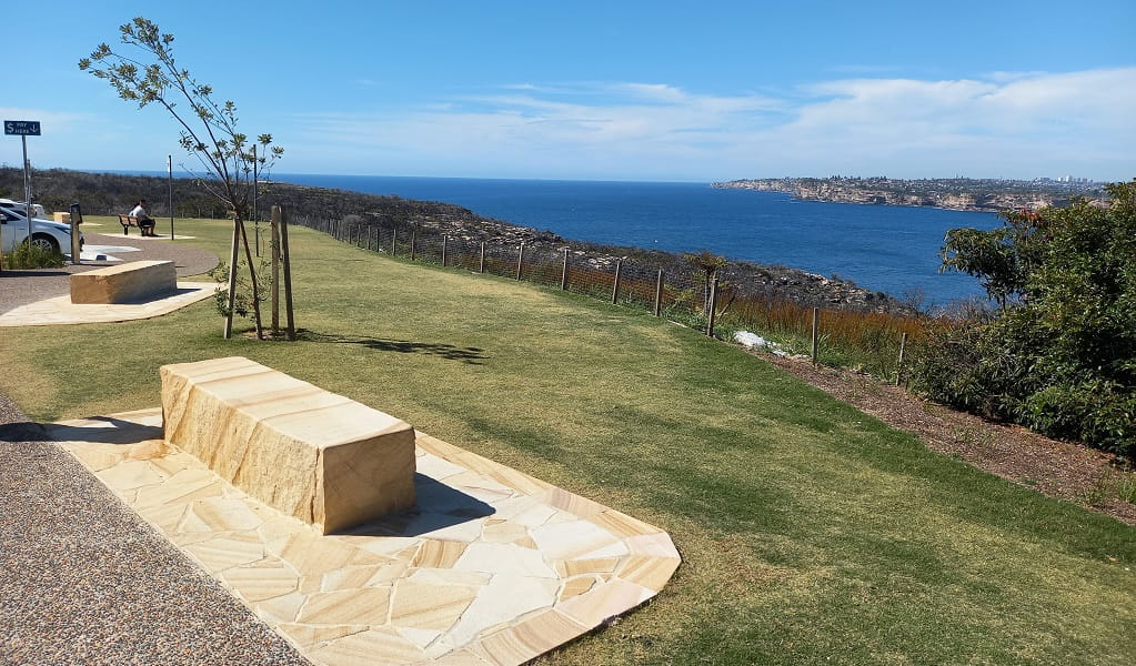 Sandstone seat overlooking the ocean at North Head lookout, Sydney Harbour National Park. Photo: Katherine Ashley &copy; DPE