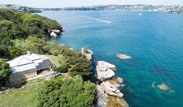 Aerial view of Steele Point Cottage by the water in Sydney Harbour National Park. Photo: G Pickford/OEH