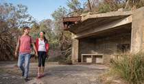 Young couple on Fort Tomaree walk in Tomaree National Park. Photo: John Spencer &copy; OEH