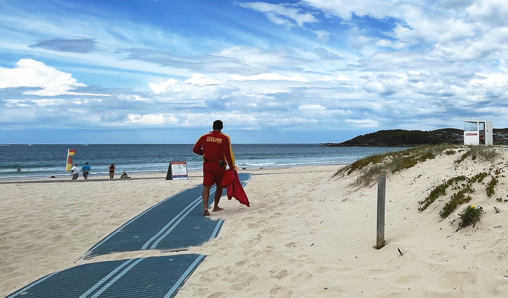 Take a dip at one of the patrolled beaches including Fingal Bay, One Mile Beach, or Birubi Point. Credit: Natasha Webb &copy; DPE