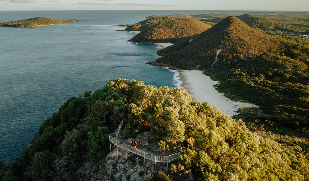 Aerial photo looking south to the lookout at Tomaree Head Summit, Zenith Beach, and the ocean. Credit: Daniel Parsons &copy; Daniel Parsons