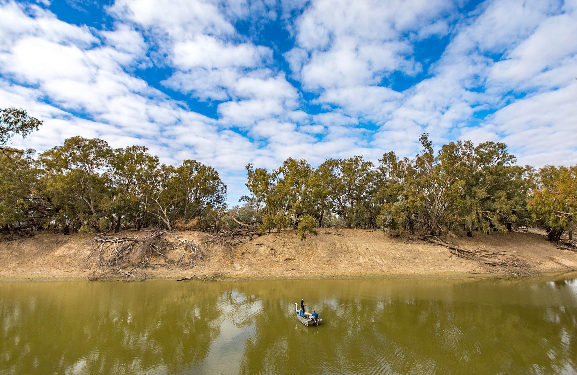Fishermen in boat on Darling River, Toorale National Park. Photo: Joshua Smith/OEH