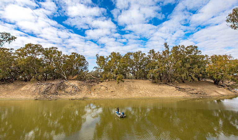 Fishermen in a boat on the Darling River, Toorale National Park. Photo: Joshua Smith/OEH.