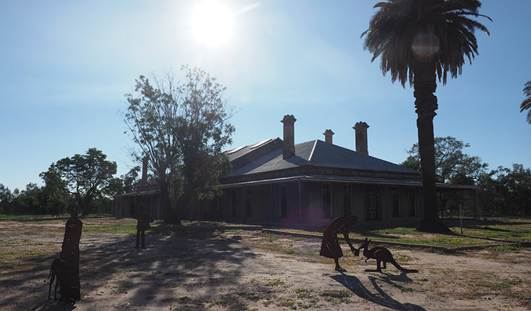 Toorale Homestead and surrounding grounds, with steel sculptures of people and animals in the foreground. Photo: Jessica Stokes &copy; OEH