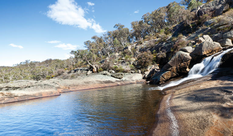 Water cascades over rocks into a waterhole at Wadbilliga National Park. Photo: Lucas Boyd &copy; OEH