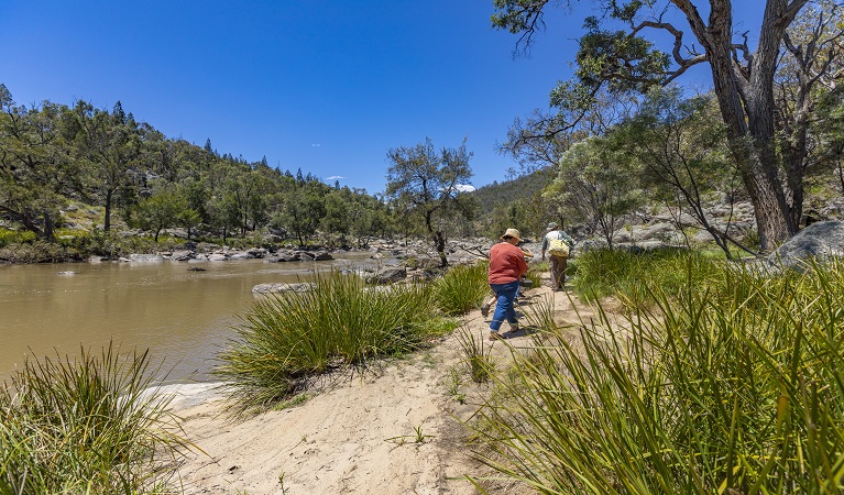 Visitors walking along the banks of the Namoi River, Warrabah National Park. Photo: Joshua J Smith &copy; DPE