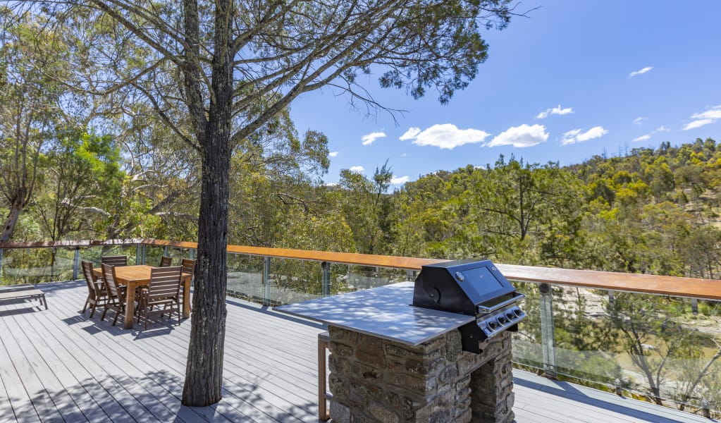 The large deck overlooking the Namoi River with barbecue and outdoor seating at Muluerindie, Warrabah National Park. Photo: Joshua Smith &copy; DPE