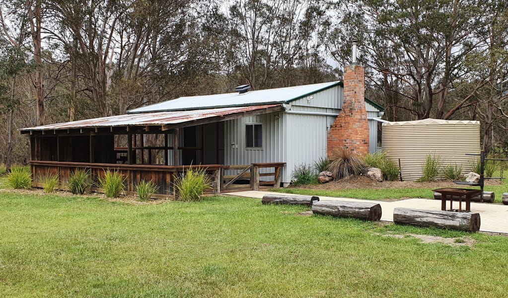 Exterior of Four Bull Hut and surrounding valley, Washpool National Park. Photo: Ann Richards/DPIE