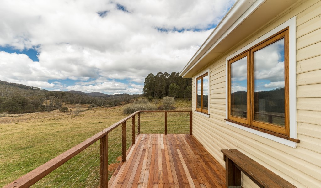 The verandah at Mooraback Cabin looking out towards Werrikimbe National Park. Photo: David Waugh &copy; DPE