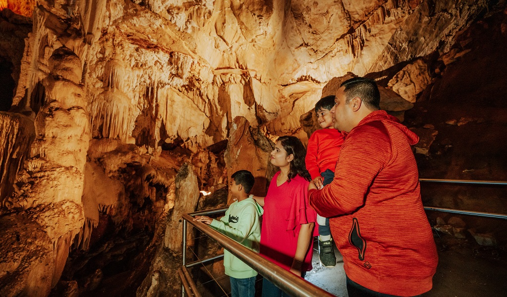 Visitors explore Fig Tree Cave on a self-guided tour. Credit: Remy Brand/DPE &copy; Remy Brand